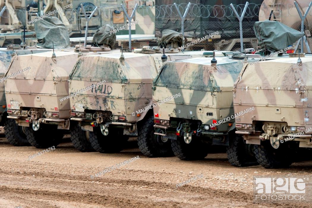 Stock Photo: A type Dingo armoured vehichles sit in the material air lock in Mazar-i-Sharif, Afghanistan, 11 December 2013. The vehichle will be brought back to German as.