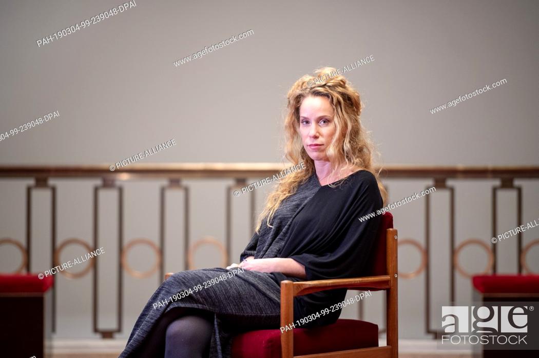 Stock Photo: 04 March 2019, Berlin: Theatre director Yael Ronen sits in the Maxim Gorki Theater foyer after the interview. Photo: Monika Skolimowska/dpa-Zentralbild/dpa.