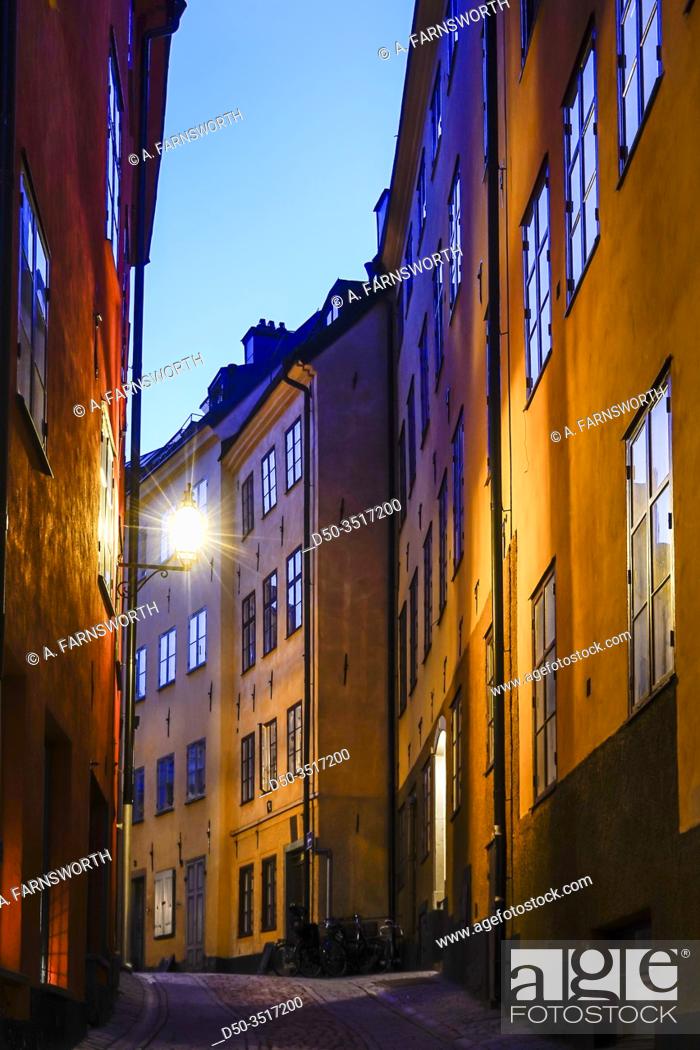 Stock Photo: Stockholm, Sweden The Old Town or Gamla Stan at dawn and the Bollhusgrand alley.