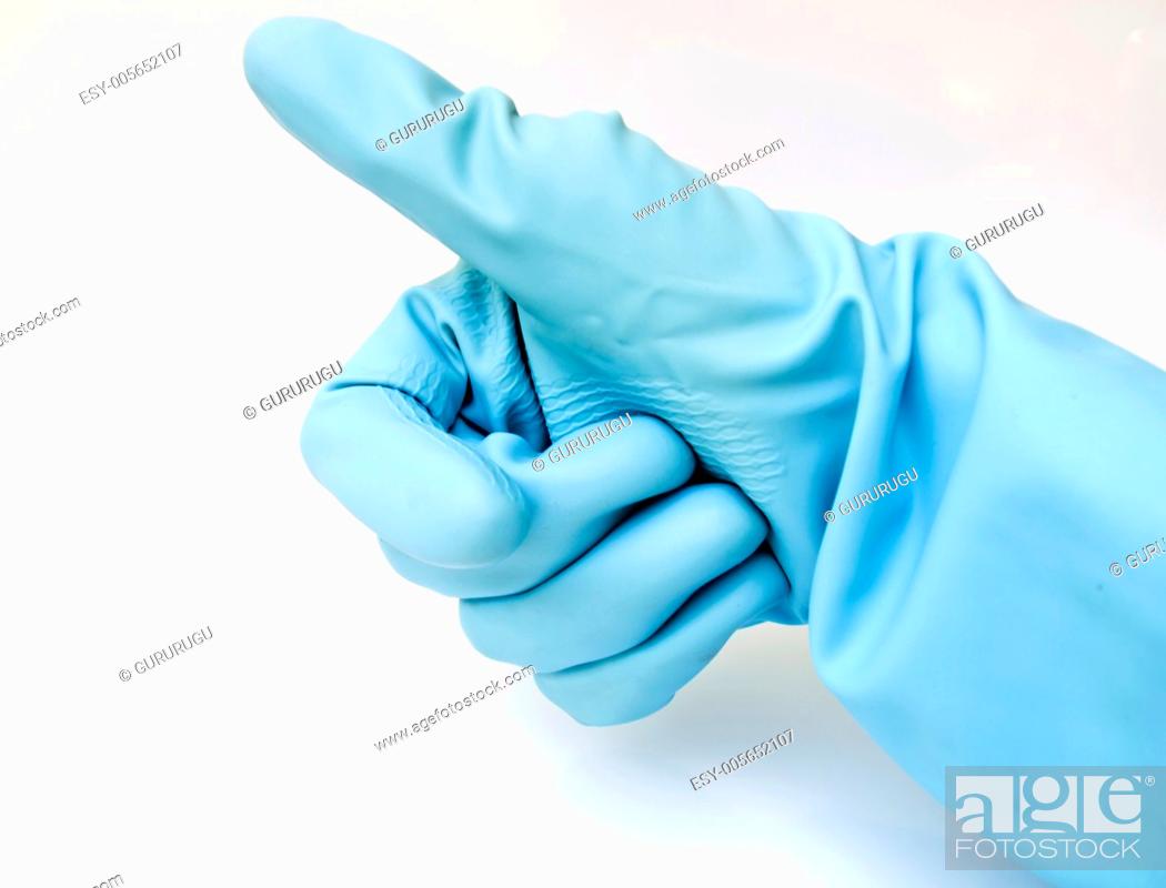 Photo de stock: light blue rubber glove hand making thumbs-up gesture.
