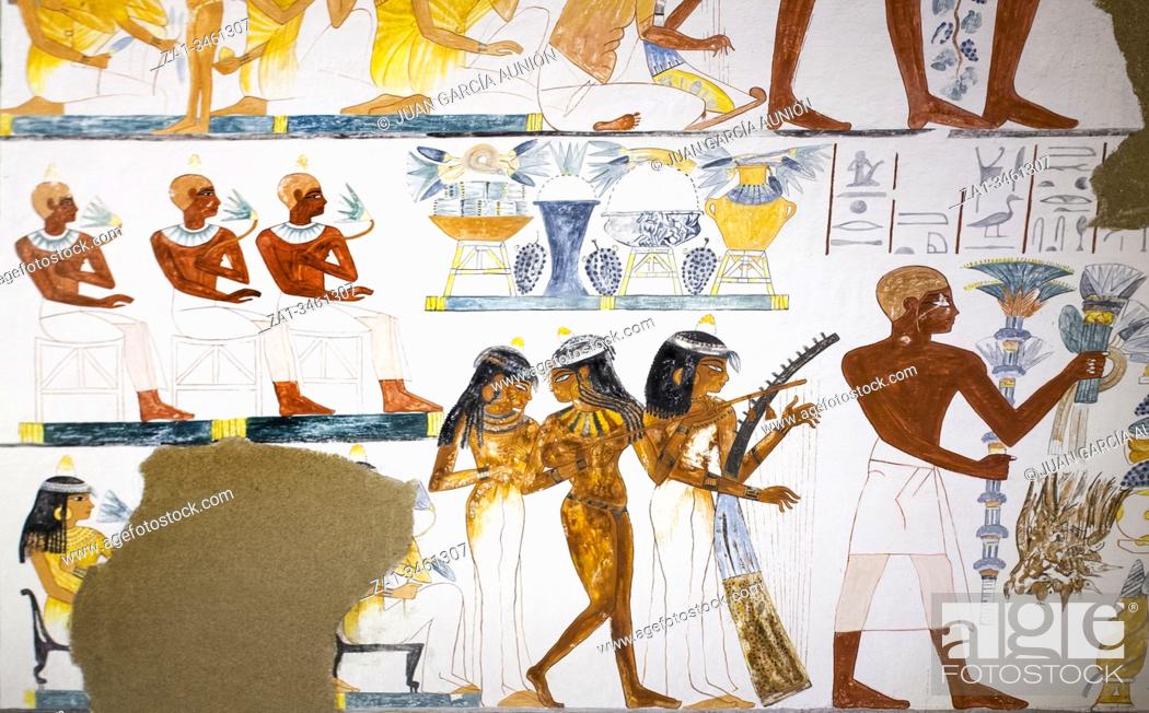 Stock Photo: Barcelona, Spain - Dec 27th, 2019: Tomb of scribe Nakht. Funerary banquet with guests, musicians and dancers. Museum of Ancient Egypt Culture of Barcelona.