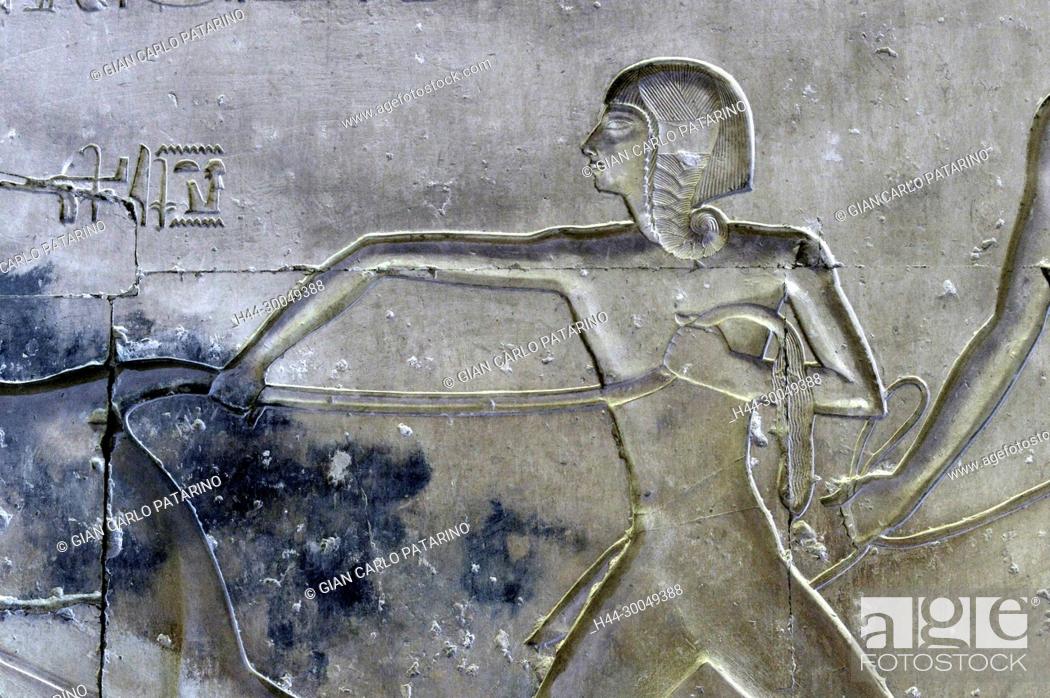 Stock Photo: Abydos, Egypt, the mortuary temple of pharaoh Seti I, Menmaatra, (XIX° dyn. 1321-1186 B.C.) - a scene on a wall.