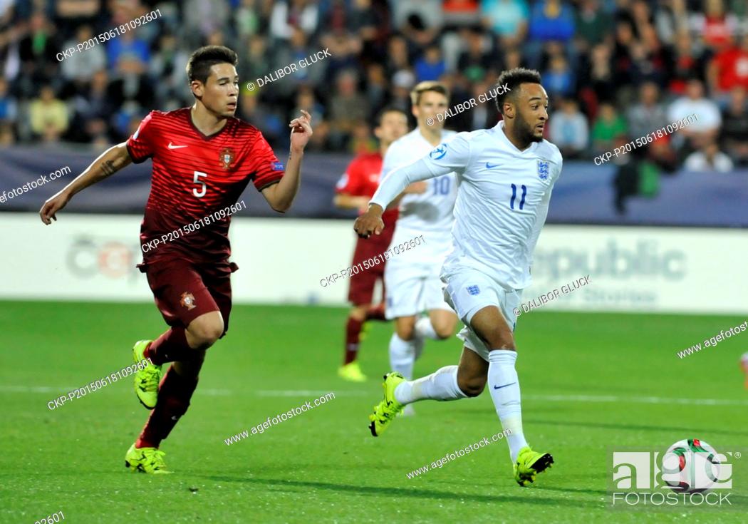 Stock Photo: From left football players Raphael Guerreiro of Portugal and Nathan Redmond of England in action during the UEFA European U21 soccer championship group B match.