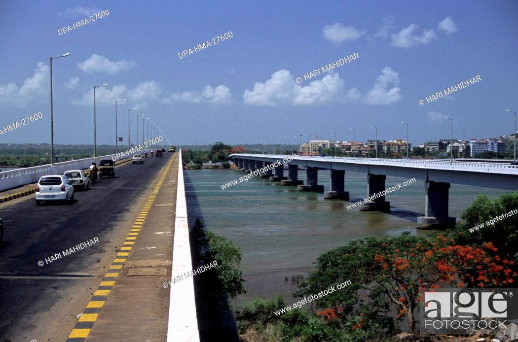 Stock Photo: goa bridge to panjim ; india.