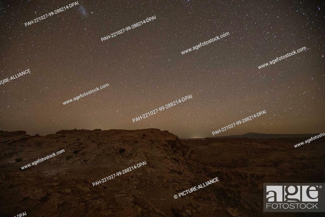Stock Photo: 27 October 2022, Chile, Atacama: Stars shine over the desert of Atacama. The Atacama Desert is known by a very clear view of the starry sky.