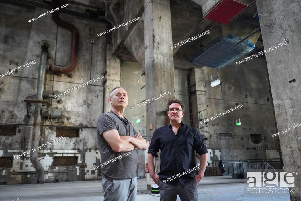 Stock Photo: 14 July 2020, Berlin: The artists Hannes Strobl (r) and Sam Auinger are standing in the sound installation ""Eleven Songs"" in the Halle am Berghain.