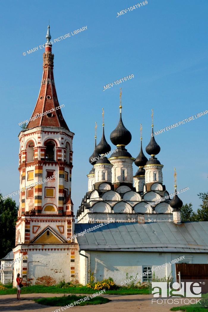 Stock Photo: View of the old belfry and towers of a small renovated church in Suzdal, Russia.