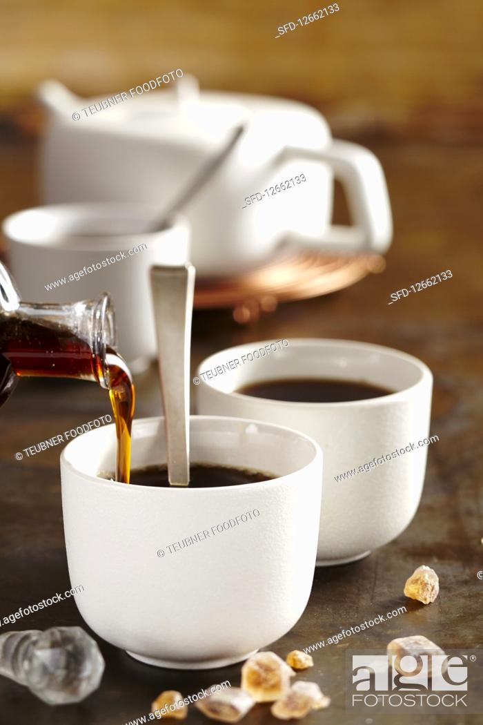 Stock Photo: A cup of tea with tonka bean syrup (Christmas).