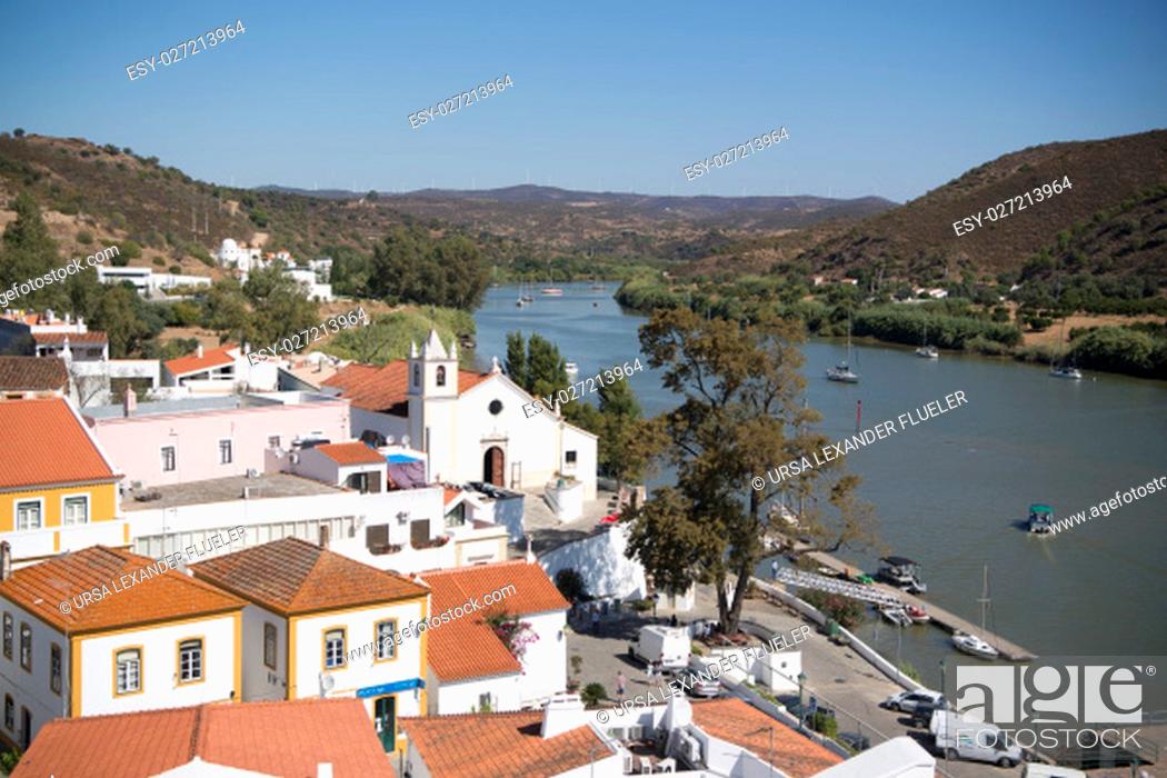Stock Photo: the town Alcoutim in Portugal at the river Rio Guadiana on the Border of portugal and Spain at the east Algarve in the south of Portugal in Europe.