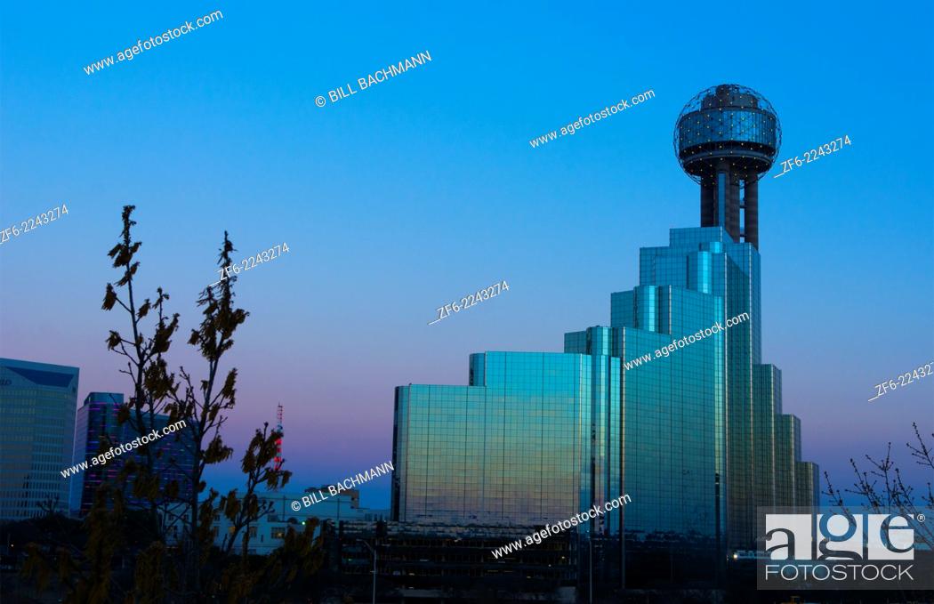 Stock Photo: Dallas Texas convention center skyline at sunset twilight night exposure in downtown Dallas city.