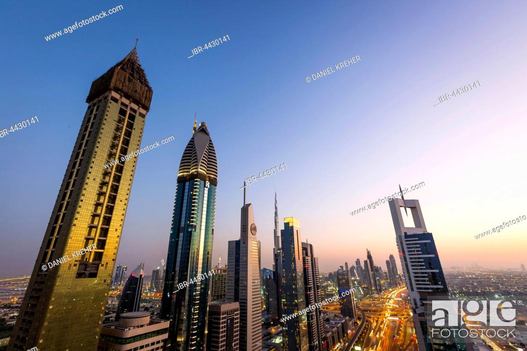 Stock Photo: View of sunset from Four Points by Sheraton, skyline and Sheikh Zayed Road, Downtown Dubai, United Arab Emirates.