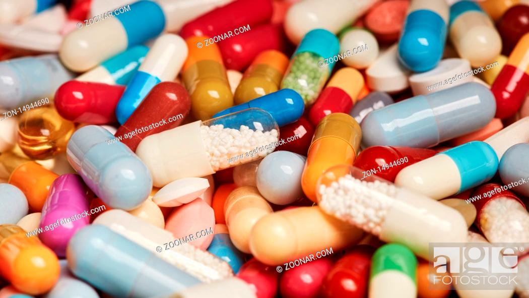 Stock Photo: Nahaufnahme von vielen bunten Medikamenten und Pillen.