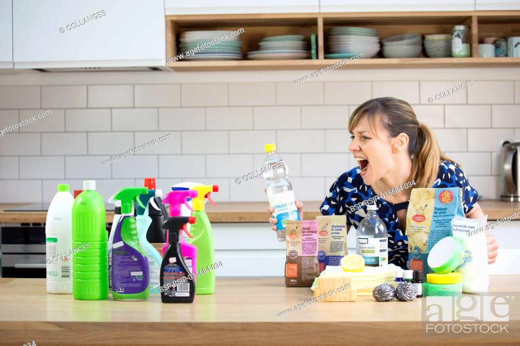 Stock Photo: Conventional and eco cleaning products.