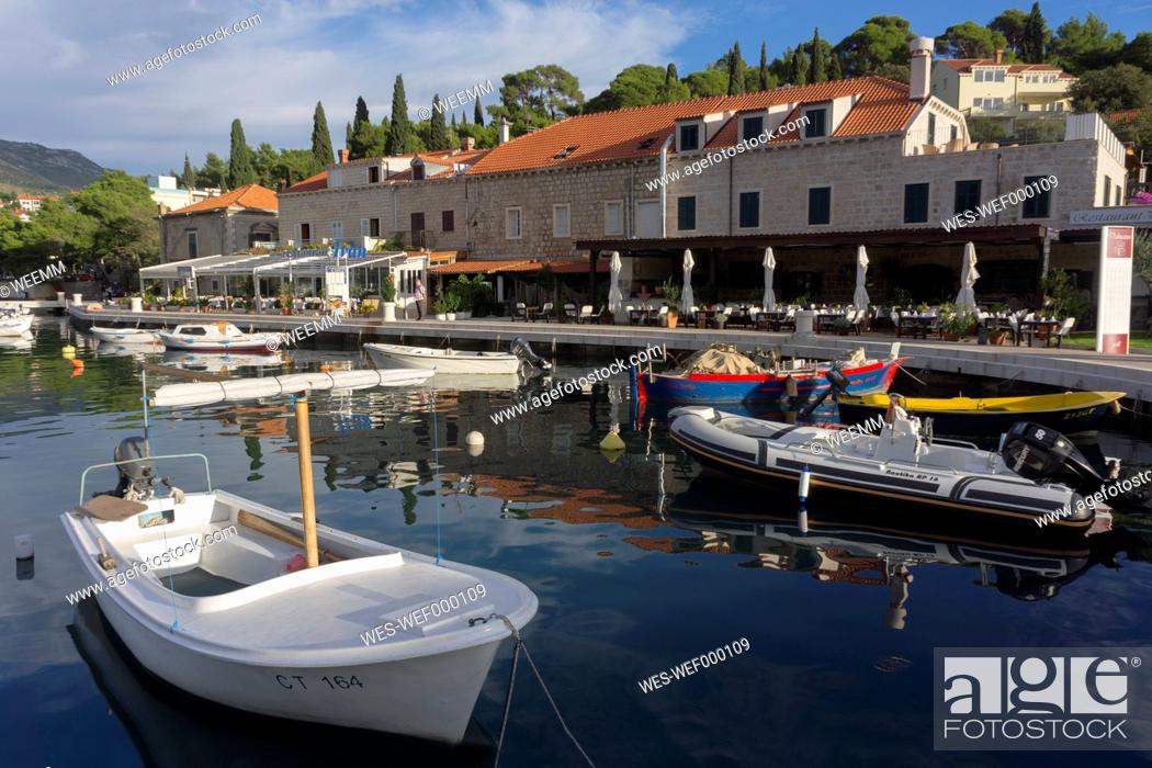 Stock Photo: Croatia, Cavtat, Restaurants at harbor.