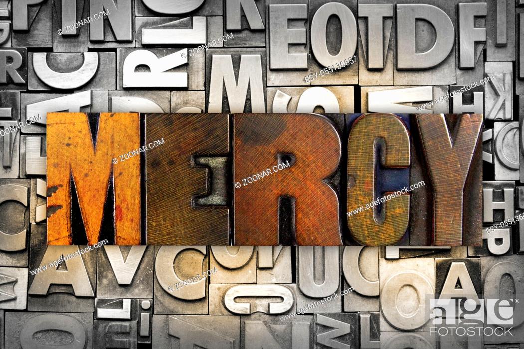 Imagen: The word MERCY written in vintage letterpress type.