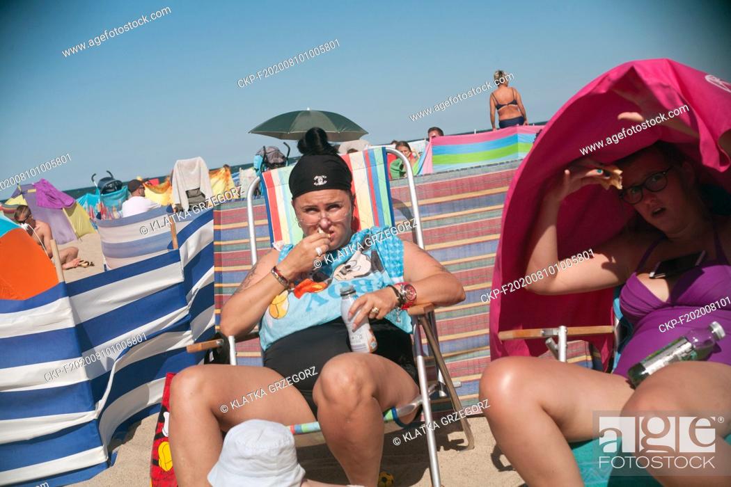Stock Photo: Poland, Wladyslawowo in Pomeranian province 14.08.2015. The women on the beach. Photo CTK/Grzegorz Klatka.