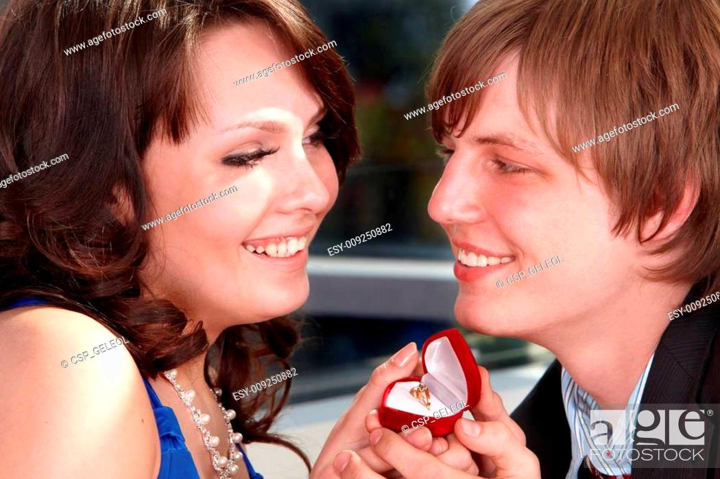 Stock Photo: Man propose marriage to girl.