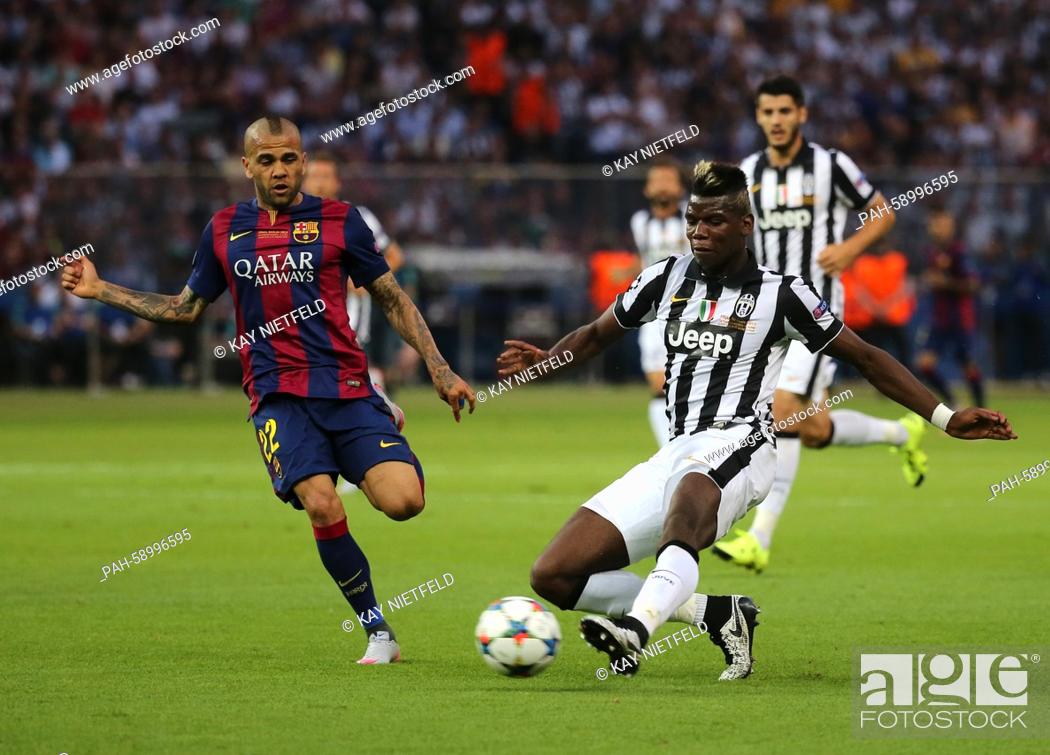 Stock Photo: Barcelona's Dani Alves (L) and Paul.Pogba of Juventus vie for the ball during the UEFA Champions League final soccer match between Juventus FC and FC Barcelona.