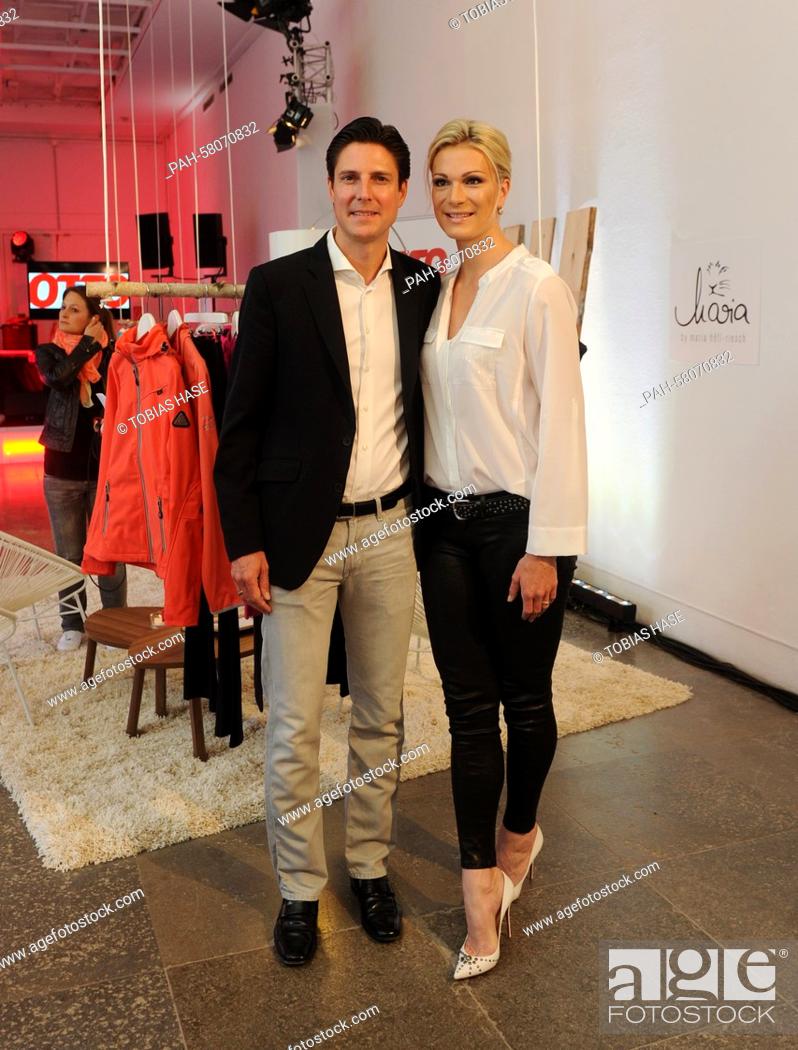 Stock Photo: Former ski racer Maria Hoefl-Riesch and her husband Marcus Hoefl pose during an event of the catalog company Otto in Munich, Germany, 04 May 2015.