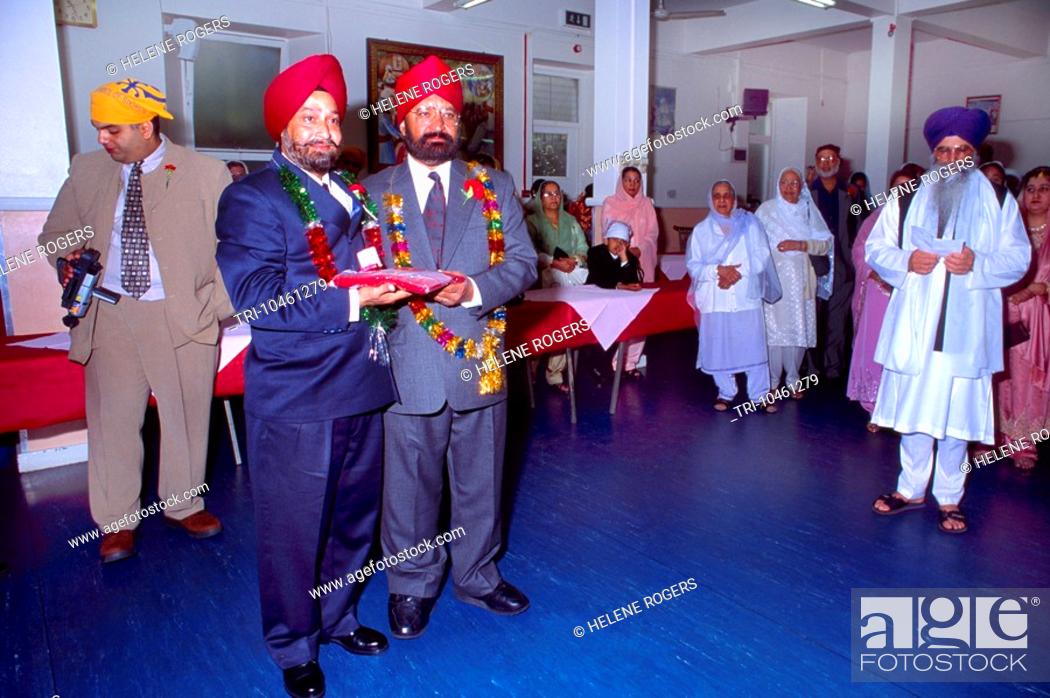 Sikh Wedding Family Members Exchanging