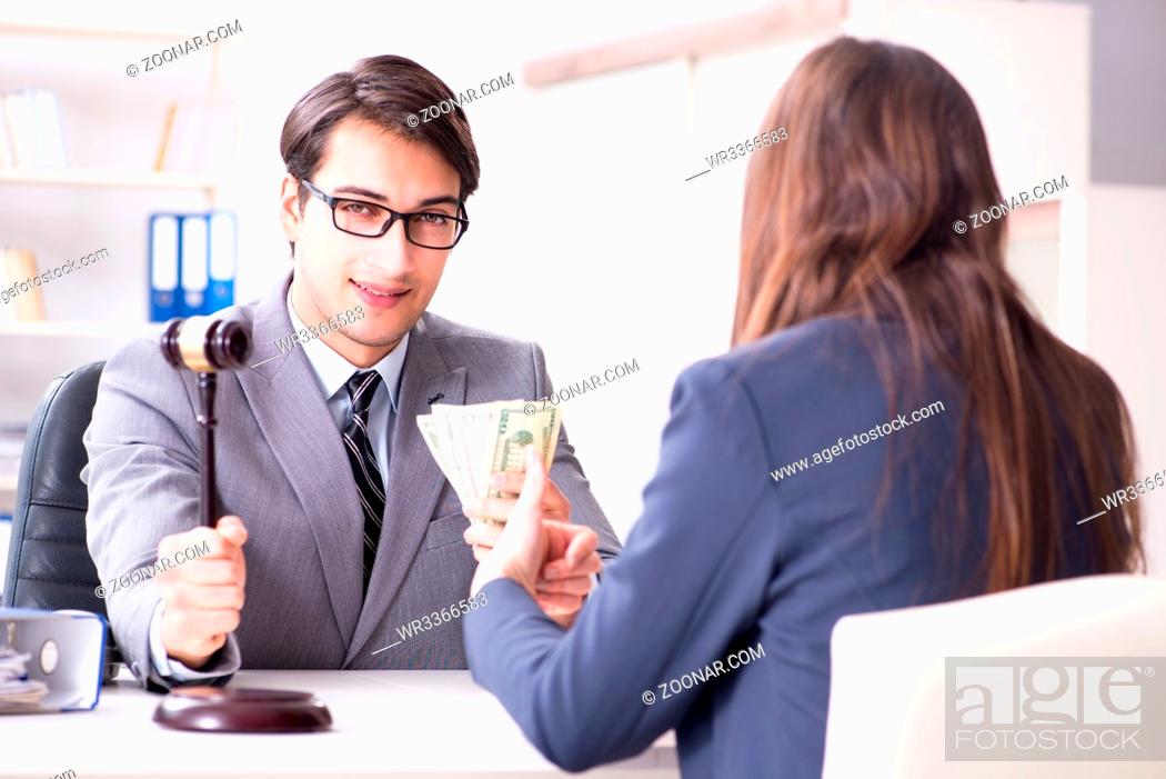 Stock Photo: Lawyer being offered bribe for his services.