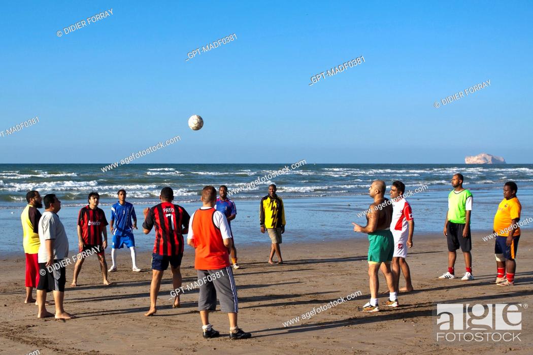Stock Photo: OMANIS PLAYING SOCCER ON THE BEACH AT THE END OF THE DAY, MUSCAT, GULF OF OMAN, SULTANATE OF OMAN, MIDDLE EAST.
