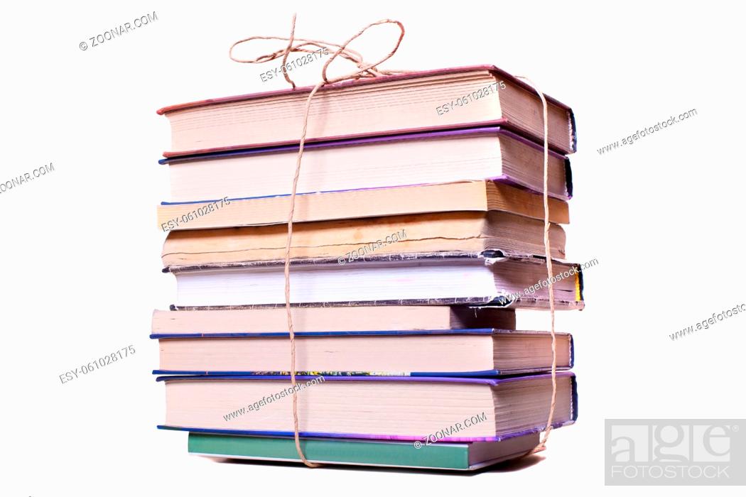 Stock Photo: Old books tied up by cord isolated.