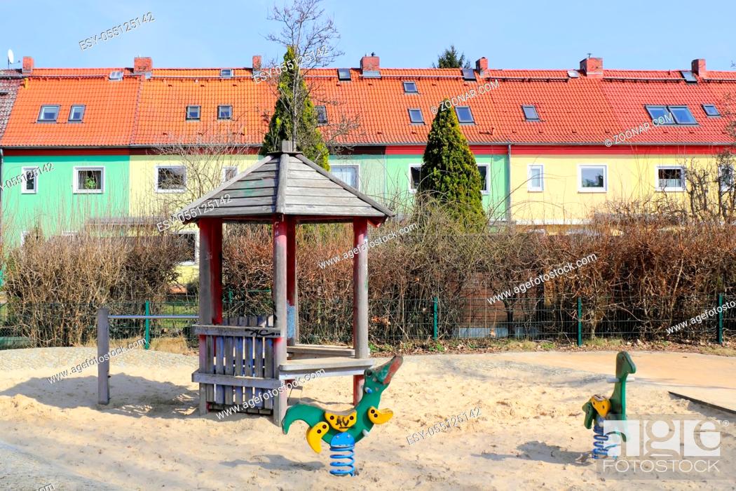 Stock Photo: Horizontal, Sand, Location, Child, Kid, Family, Playing, Save, House, Europe, City, Old, Architecture, Building, Facade, Roof, Rooftop, Town, Berlin, Germany, Living, Loan, Idyllic, Villa, Kind, Front, Broker, Terraced, Apartment, Flat