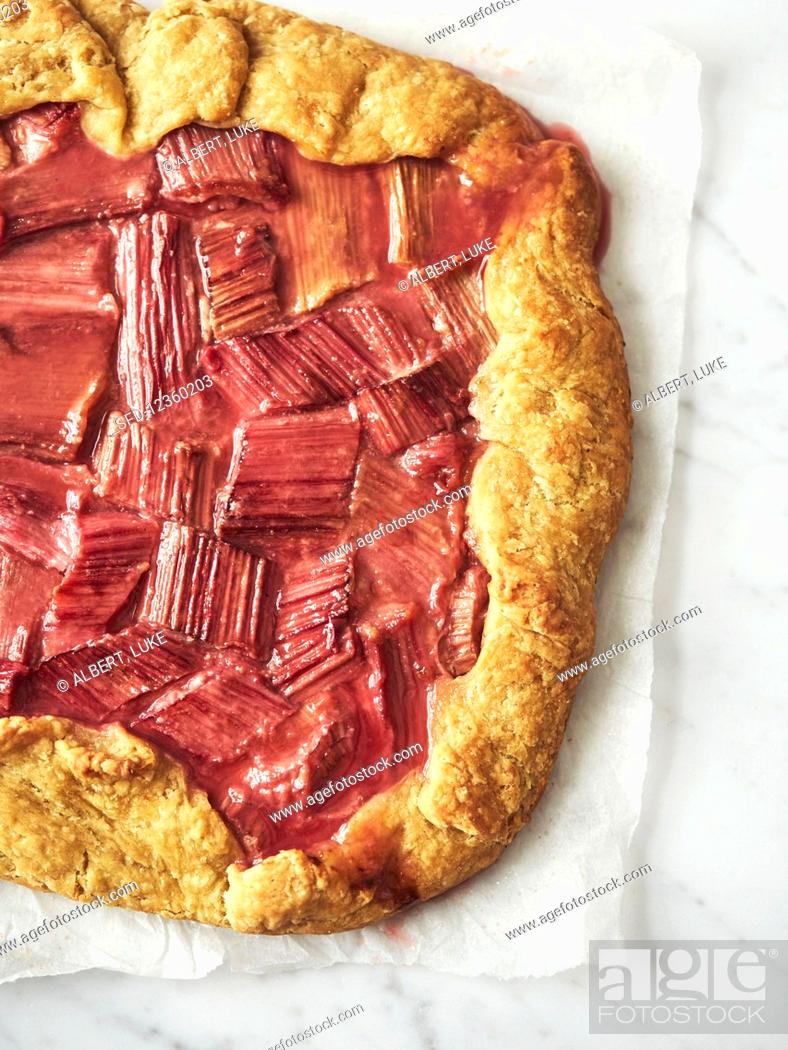 Stock Photo: Rhubarb galette with stem ginger cream.