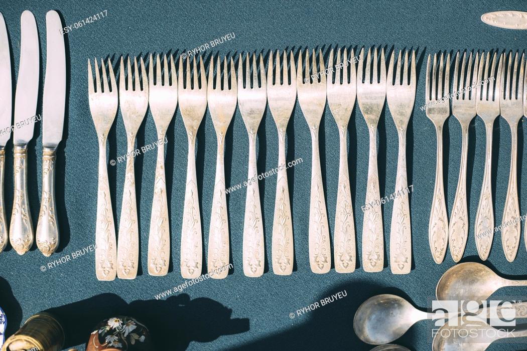 Stock Photo: Vintage Forks On Tablecloth. Kitchenware. Set Of Old Kitchen Utensils. Old Crockery Concept. Fork Set. Vintage Silverware.
