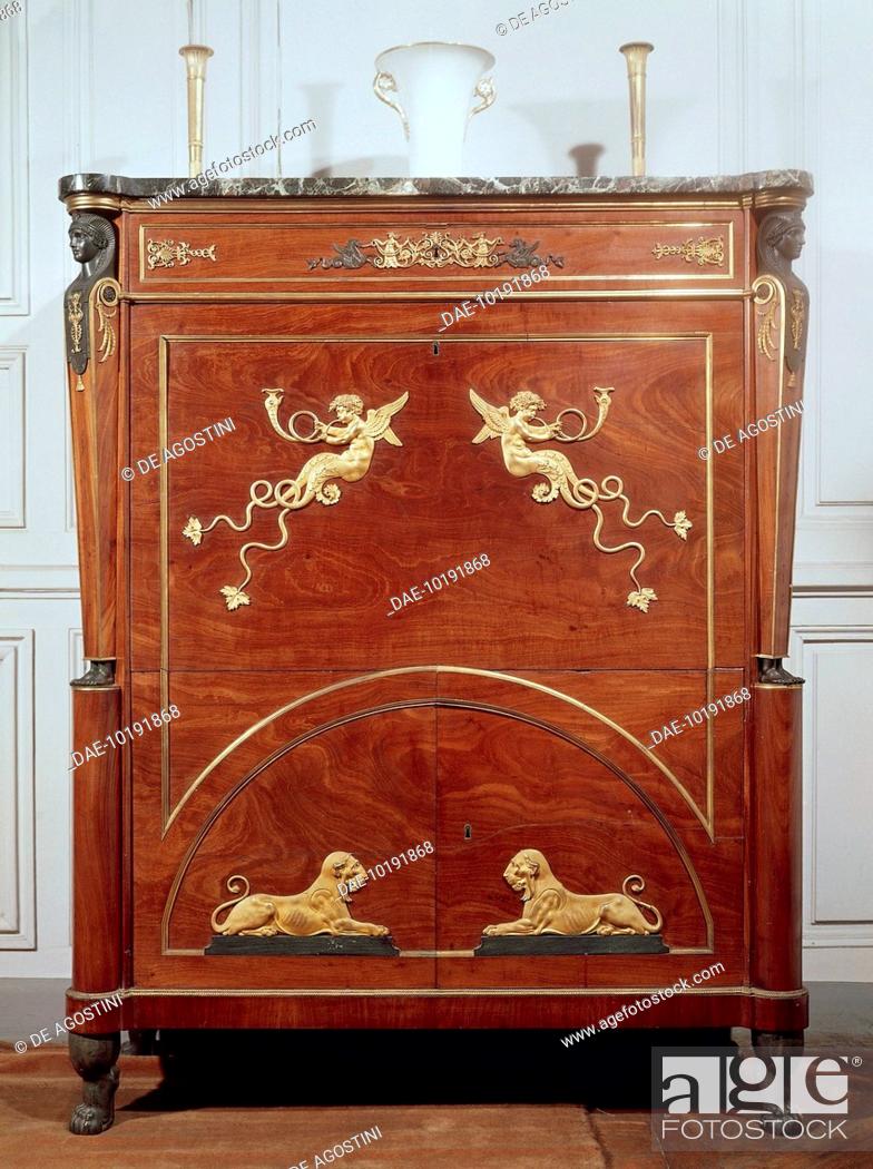 Stock Photo: Mahogany commode-secretary with bronze decorations, designed by Charles Percier (1764-1838) and Pierre-Francois-Leonard Fontaine (1762-1853).
