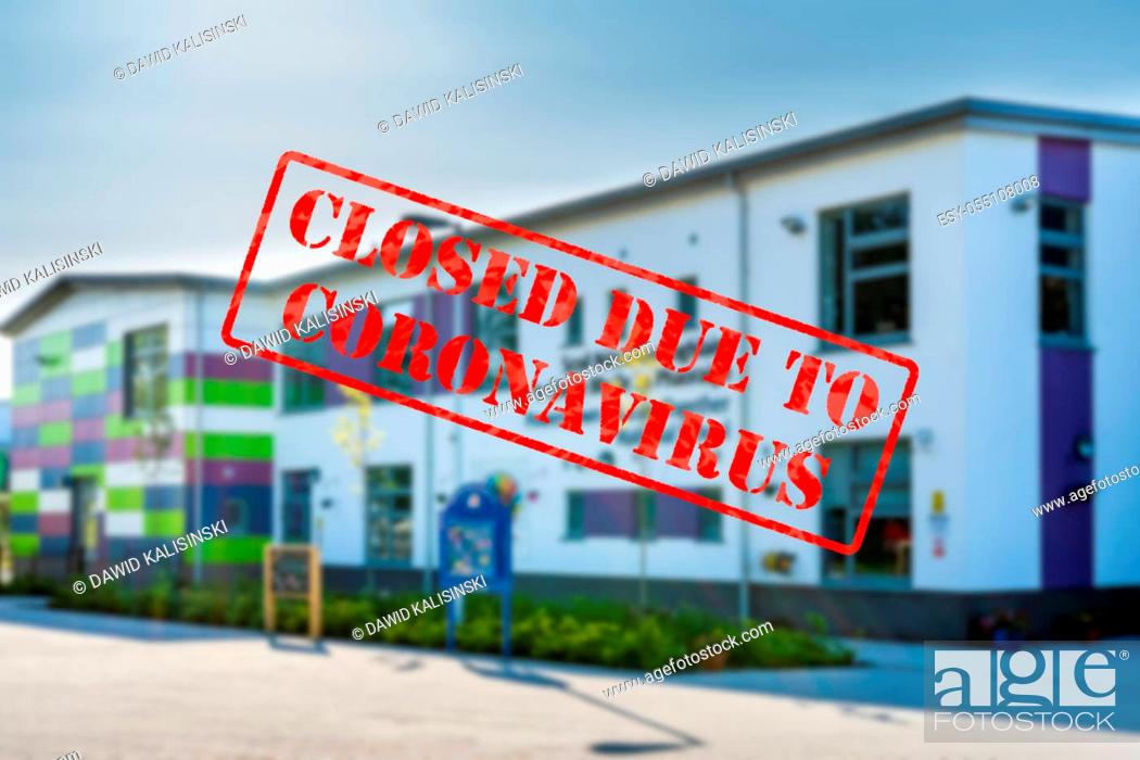 Photo de stock: Defocused, blurred view of exterior of school or kindergarten building, empty and closed due to coronavirus or covid 19 pandemics.
