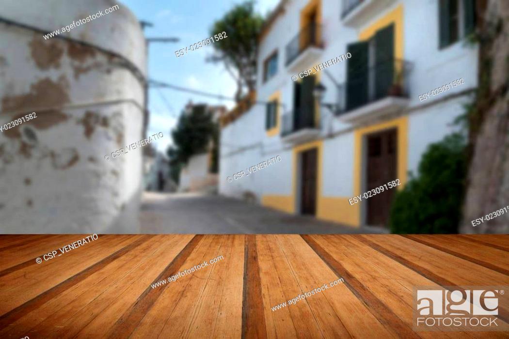 Stock Photo: Typical old Mediterranean alley between old houses with wooden planks floor.