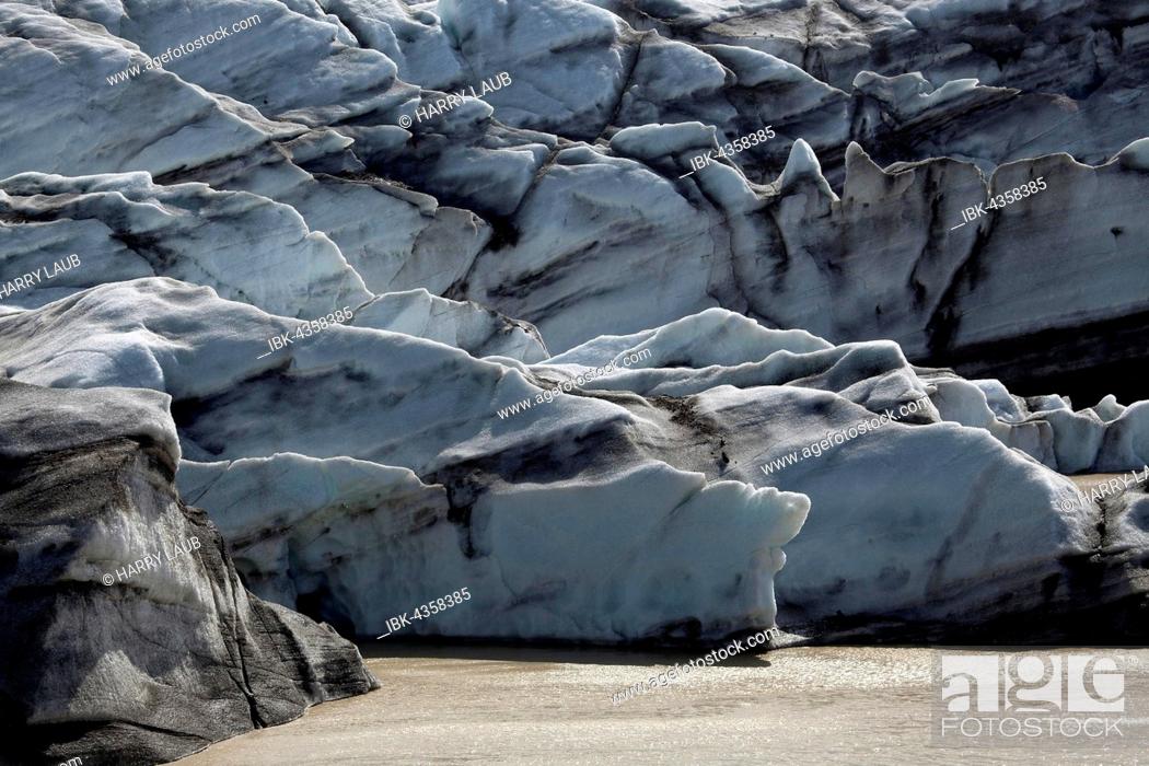 Stock Photo: Ice, glacier ice with traces of volcanic ash, icebergs at glacier Svinafellsjökull in Skaftafell, Southern Iceland, Iceland.