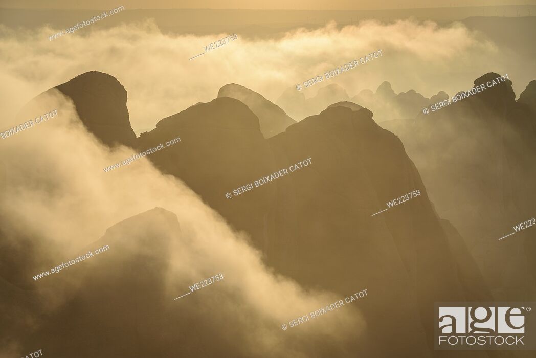 Stock Photo: Sunset in Montserrat with fog looking to the regions of the Ecos, Frares Encantats and Agulles, seen from the Sant Jeroni summit (Barcelona region, Catalonia.