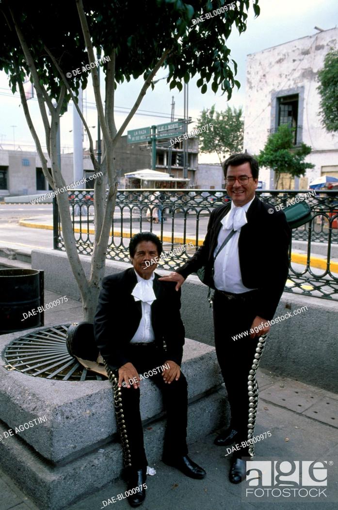 Stock Photo: Mariachi (trumpet players) under the portico in Plaza Garibaldi, Mexico City, Mexico.