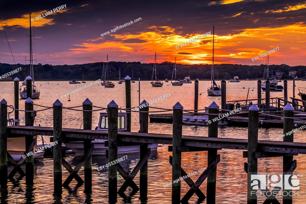 Stock Photo: Sunset Pier Padanaram Inner Harbor Motorboats Sailboats Dartmouth Massachusetts. . .