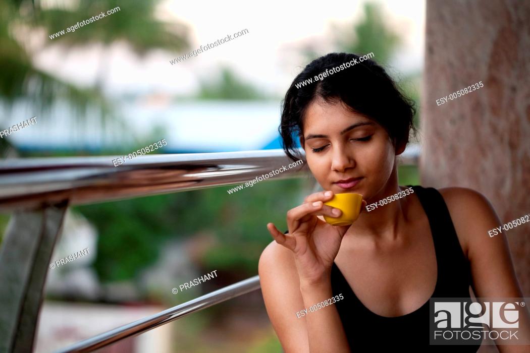Stock Photo: Indian girl with tea.