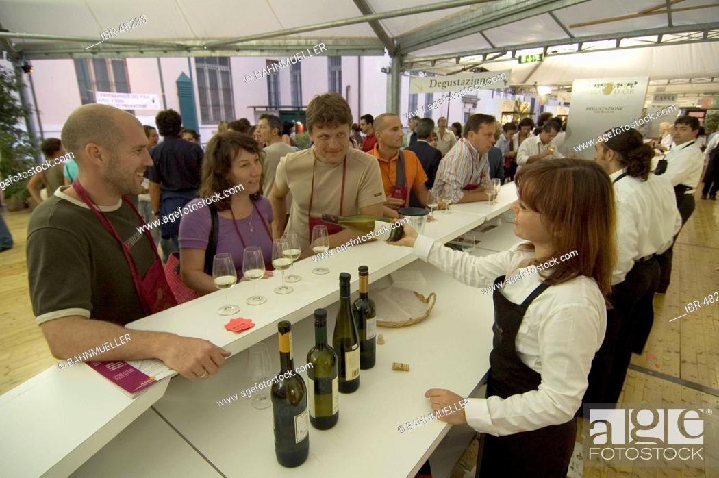 Stock Photo: Sommelier at the wine fair Douja d'Or in Asti Piedmont Piemonte Italy.