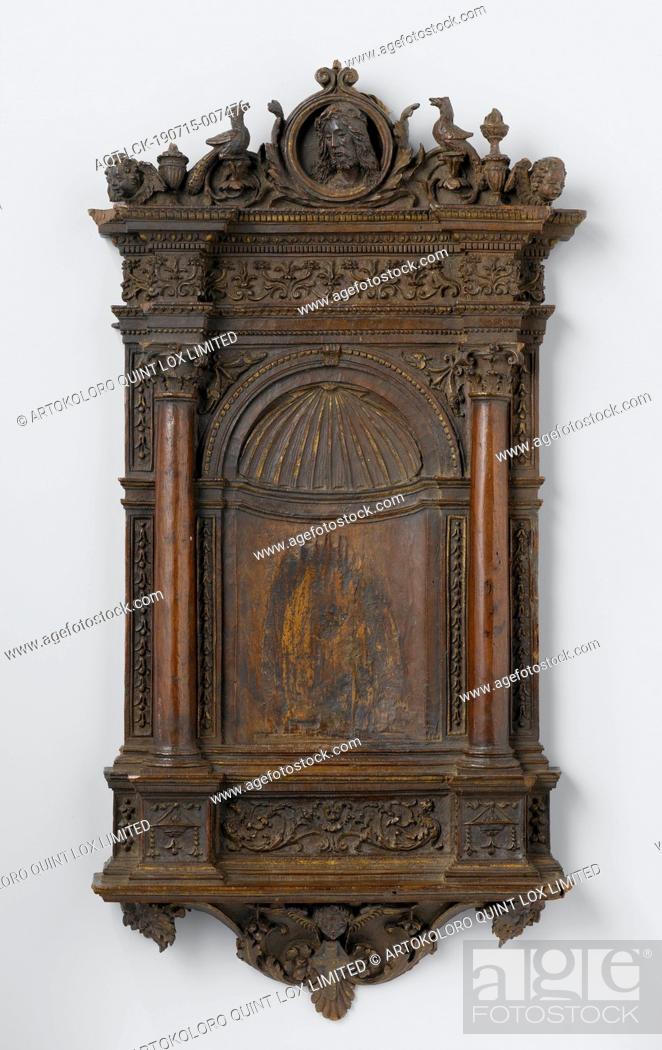 Stock Photo: Tabernacle door with coat of arms of the Piccolomini, Tabernacle door of walnut. Two Corinthian half-columns on a cloaked base flank a niche and support the.