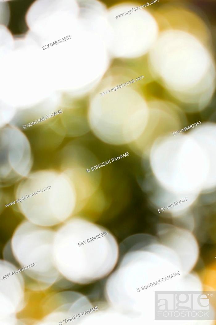 Photo de stock: Blurred lights yellow bokeh abstract light background.