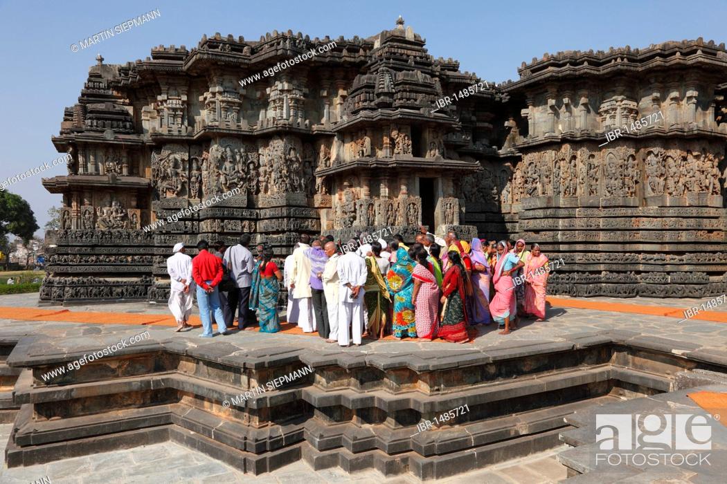 Stock Photo: Indian tourist group at the Hoysaleswara Temple, Hoysala style, Halebidu, Karnataka, South India, India, South Asia, Asia.
