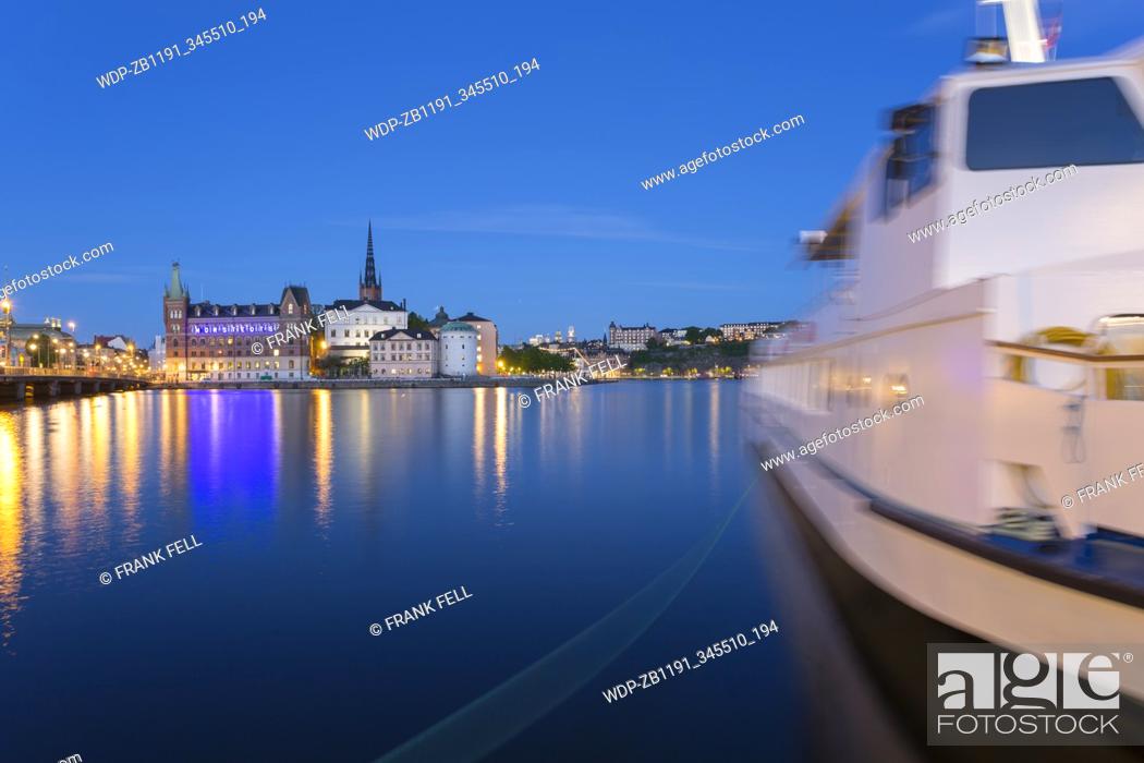 Stock Photo: View of Riddarholmen and Sodermalm at dusk from near Town Hall, Stockholm, Sweden, Scandinavia, Europe.