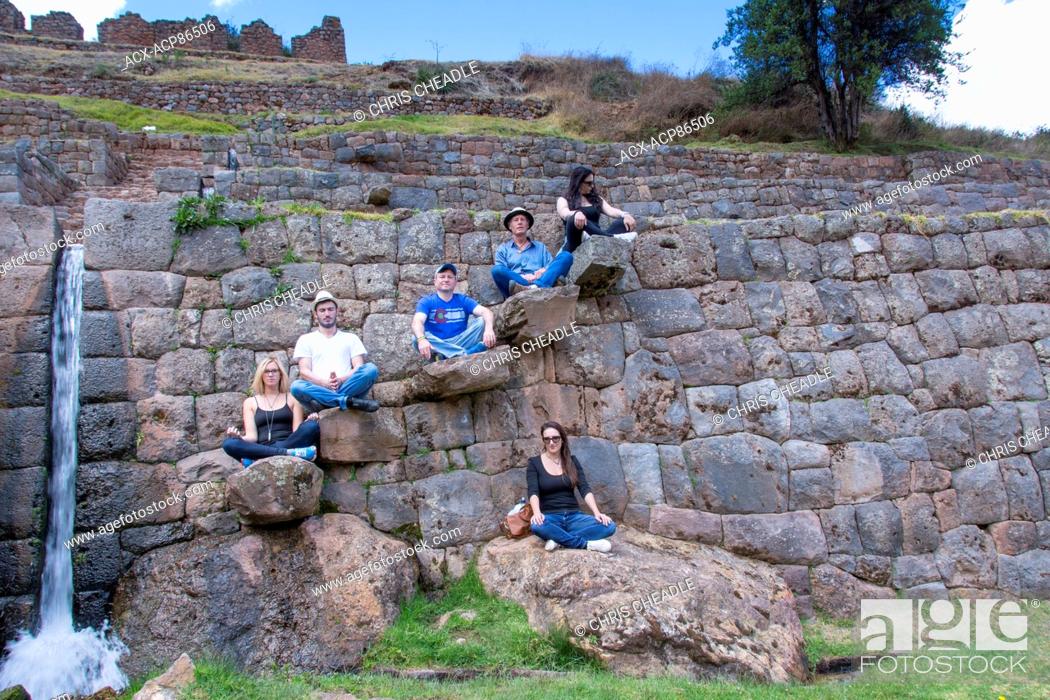 Stock Photo: Travellers at Tipùn, located east of Cusco, are Inca ruins, Peru.