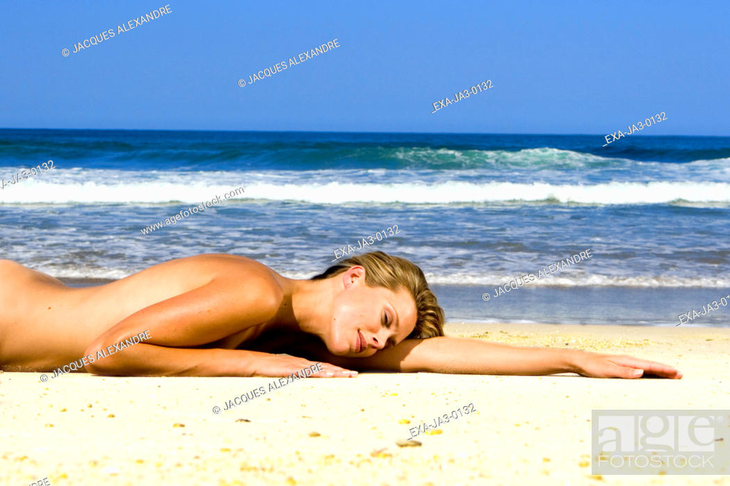 Girl lying down on the beach nude Nude Woman Laying On Sand At Beach Stock Photo Picture And Rights Managed Image Pic Exa Ja3 0132 Agefotostock