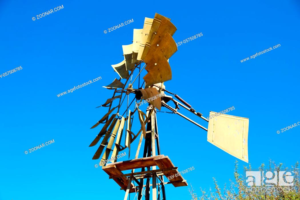 Stock Photo: blur south africa windmill turbine technology in the national park.