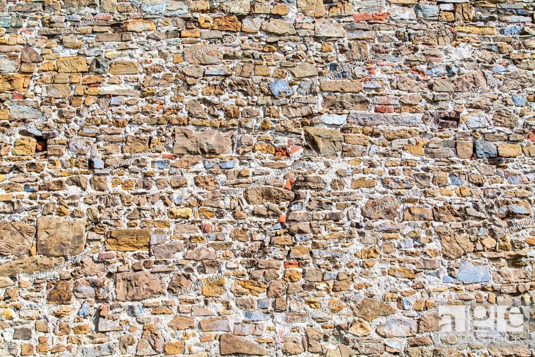 Stock Photo: Stone wall texture background natural color. Closeup.