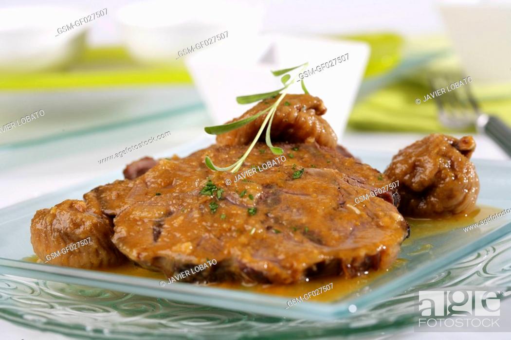 Stock Photo: Veal knuckle with dried figs.