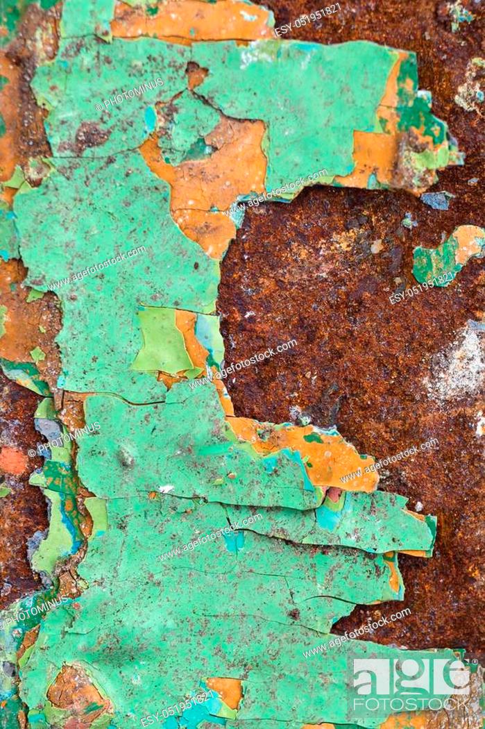 Stock Photo: Close Up texture of Chipped peeling green paint over rust, covered with crumbling Paint.