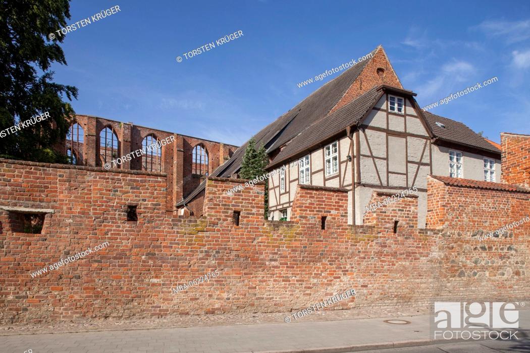 Stock Photo: Stralsund, St. John's Abbey, convent wall with half-timbered house and monastery ruins.